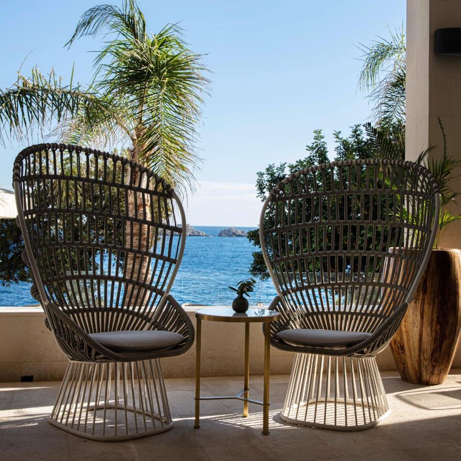 Royal Palm Hotel Dubrovnik Exterior photo The "Lotus" armchair