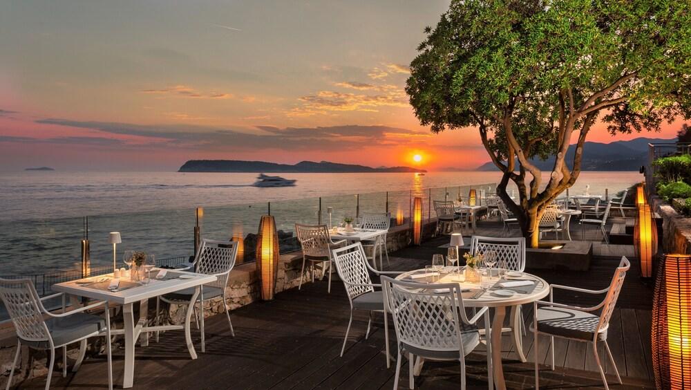 Royal Palm Hotel Dubrovnik Exterior photo Sunset at the restaurant